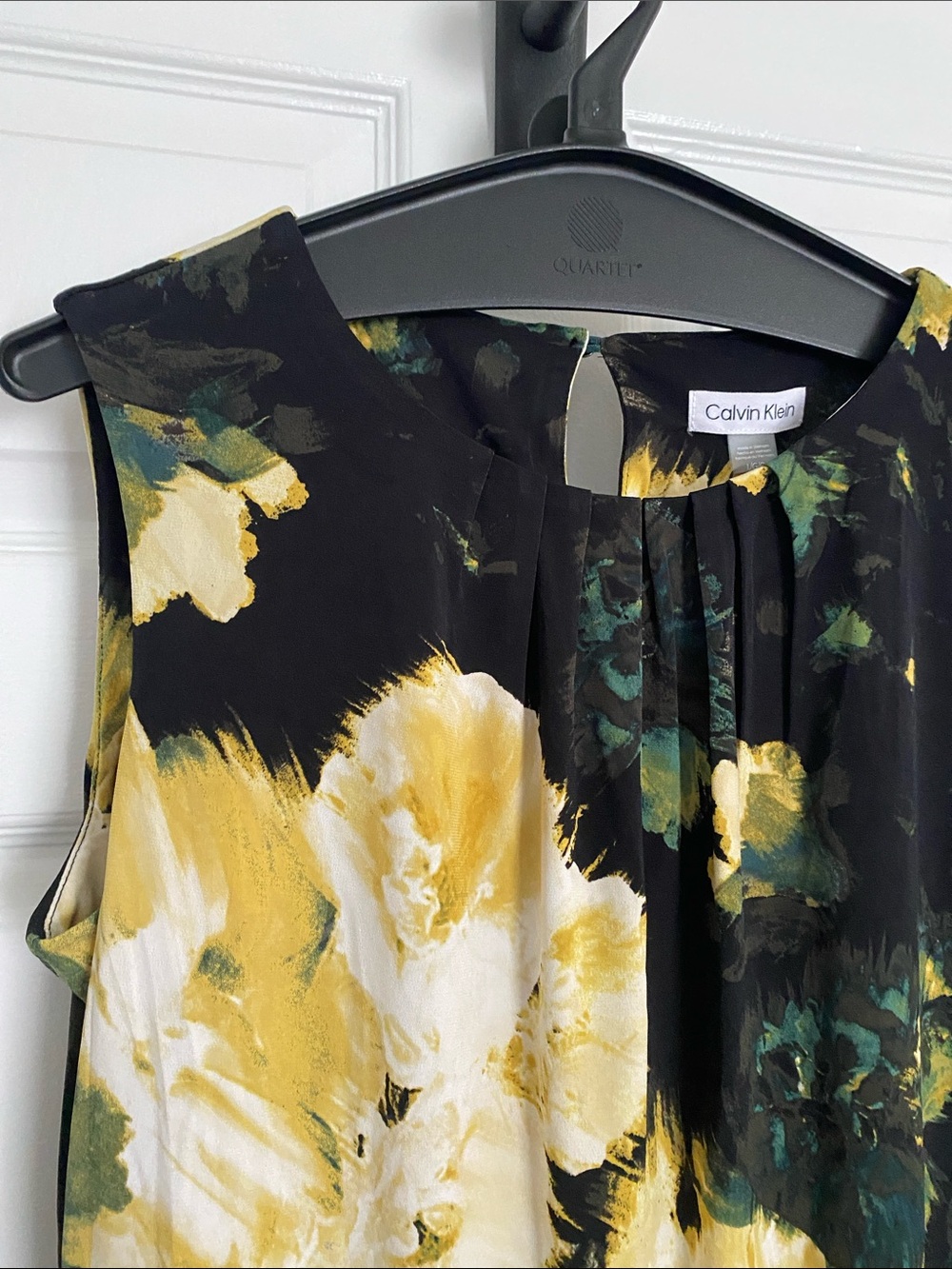 NWT Calvin Klein Black sleeveless top with Yellow and Green Floral Print